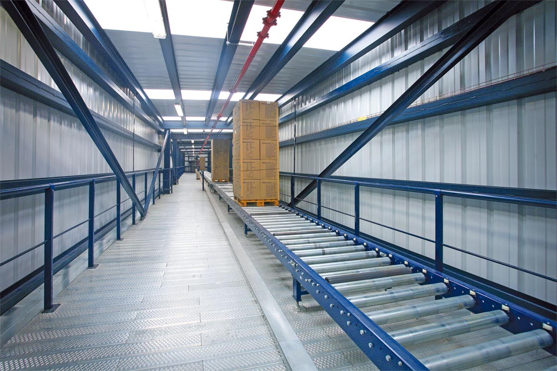 Conveyors connect the storage and production areas